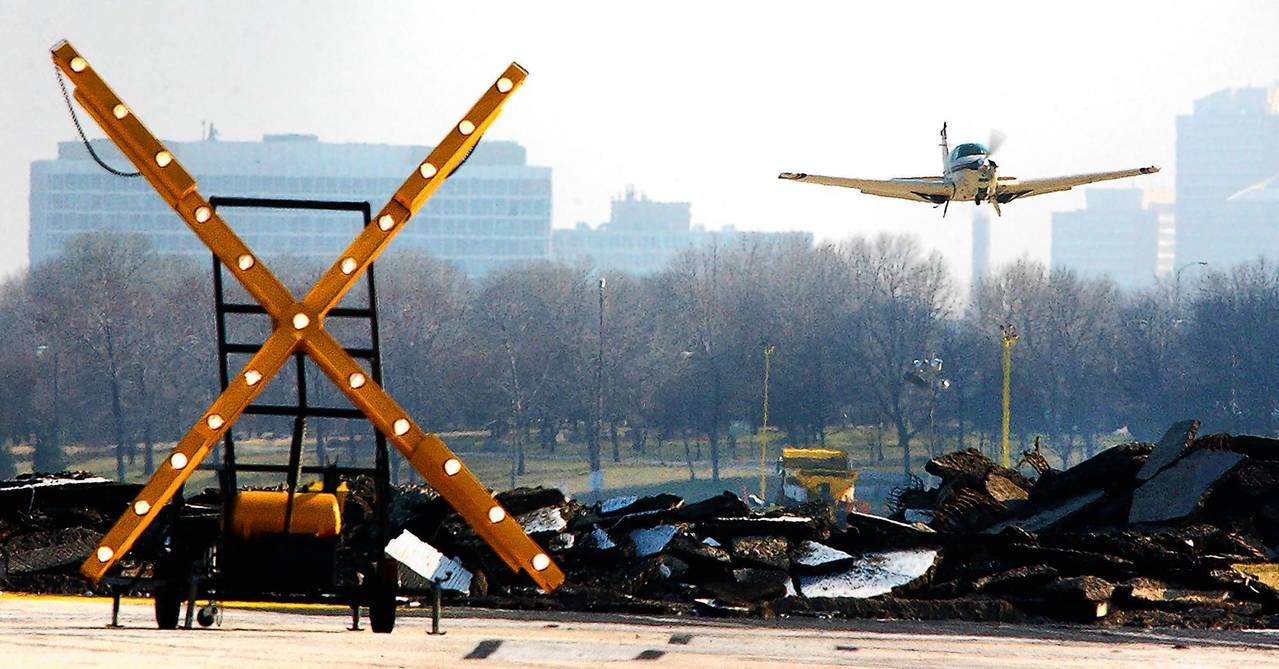 Aircraft taking off from Meigs Field after demolition