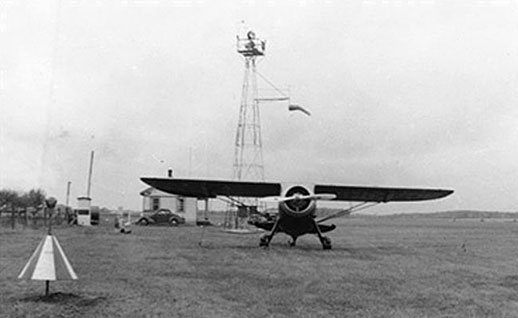 Early airfield with a rotating light beacon