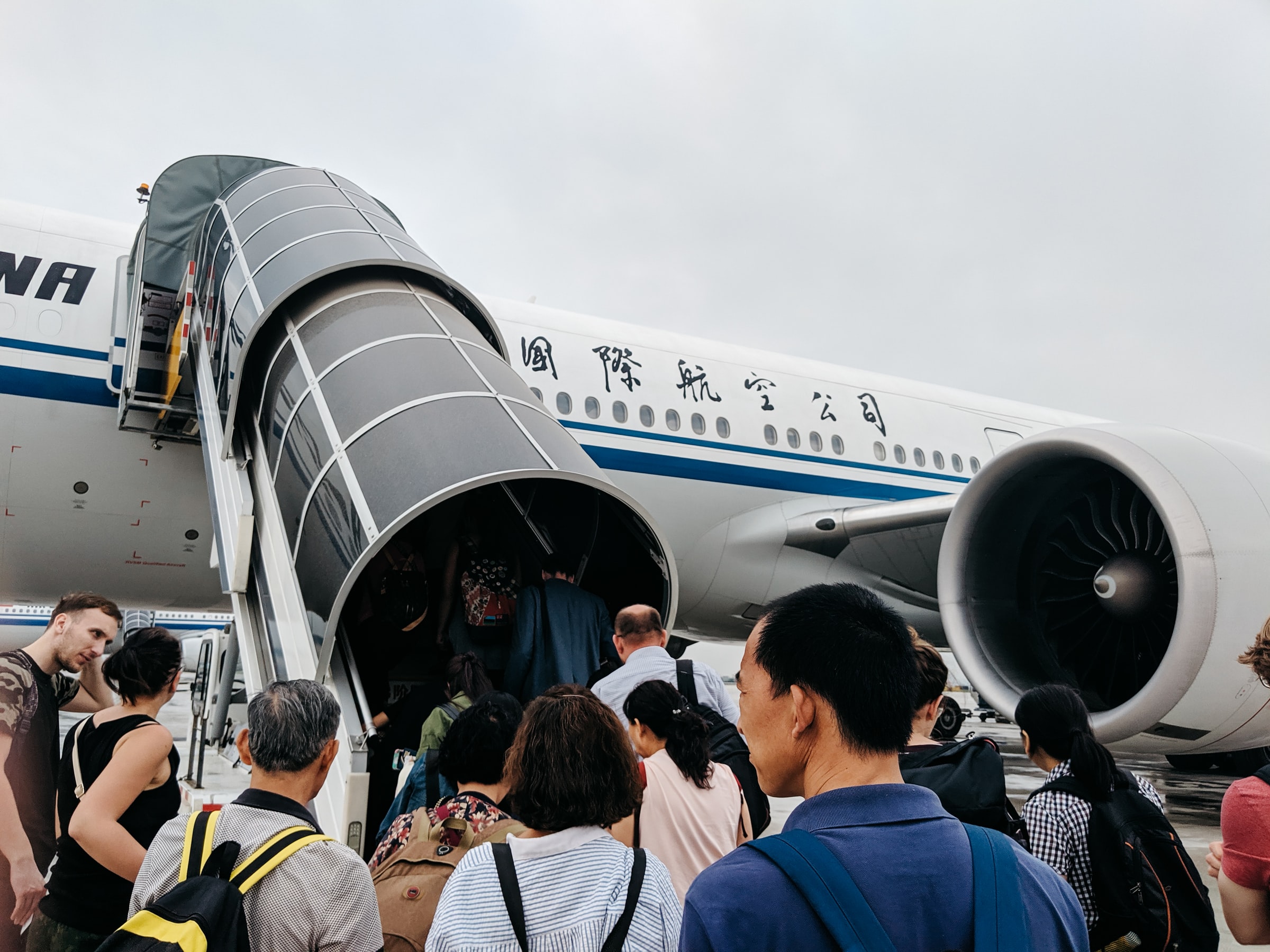 Passengers board an aircraft