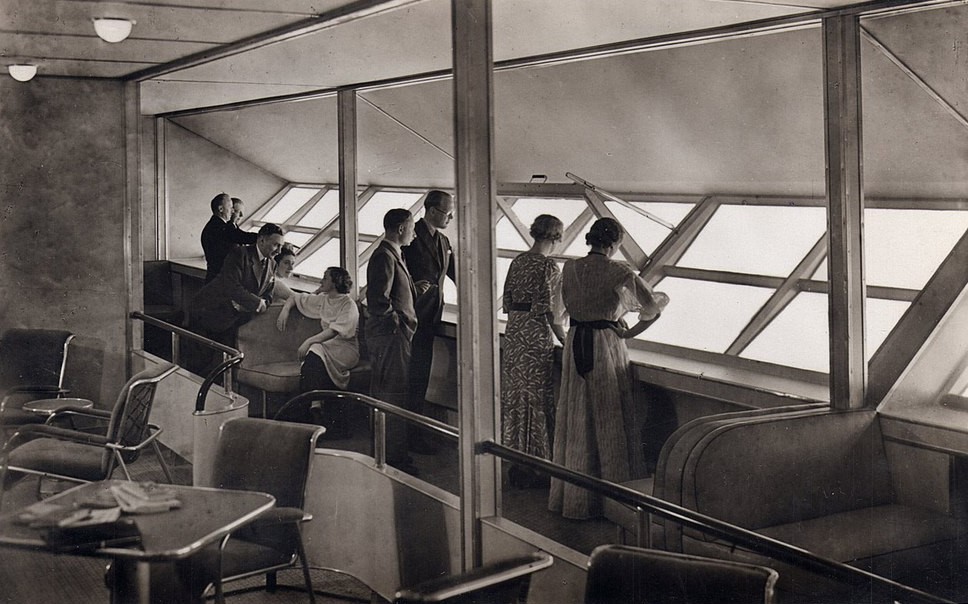 Passengers looking out the windows from inside the Hindenburg